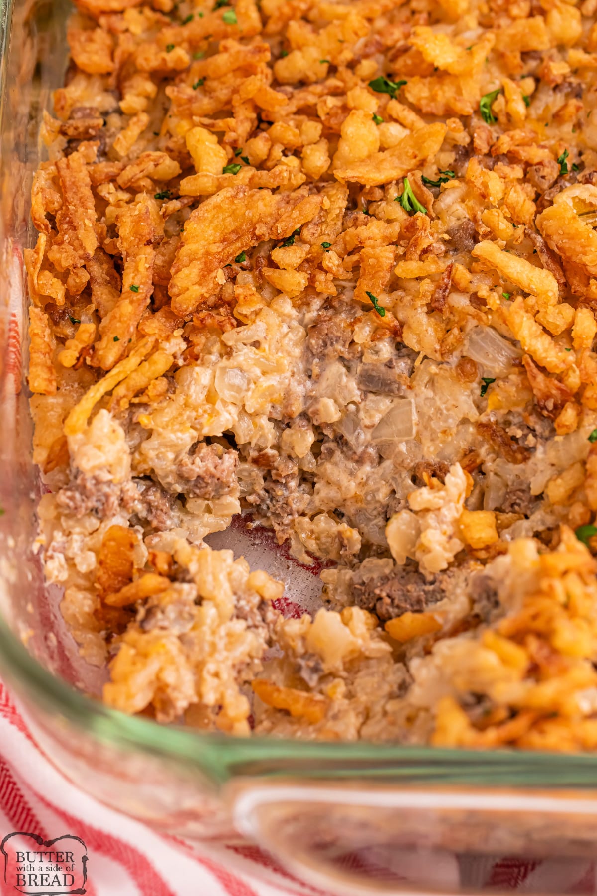 French Onion Beef Rice Casserole is the perfect weeknight dinner recipe. Delicious casserole recipe made with ground beef, rice, french onion soup mix, and topped with french fried onions.