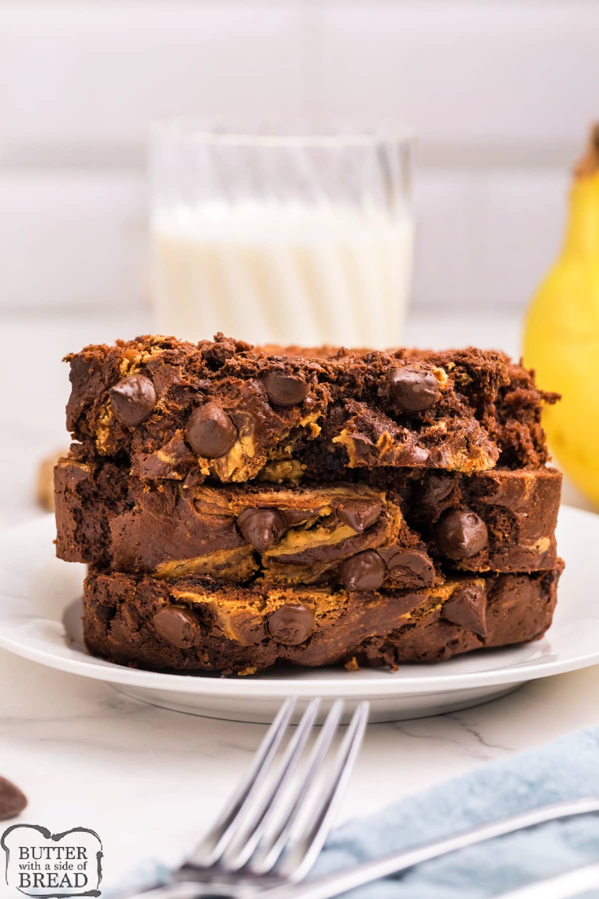 Chocolate Peanut Butter Banana Bread is a twist on the traditional banana bread recipe.  Banana bread is even better when you add chocolate and peanut butter! 