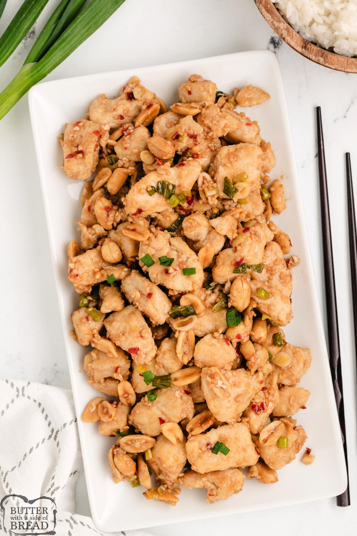 Asian chicken recipe made with garlic, green onions, and peanuts. 