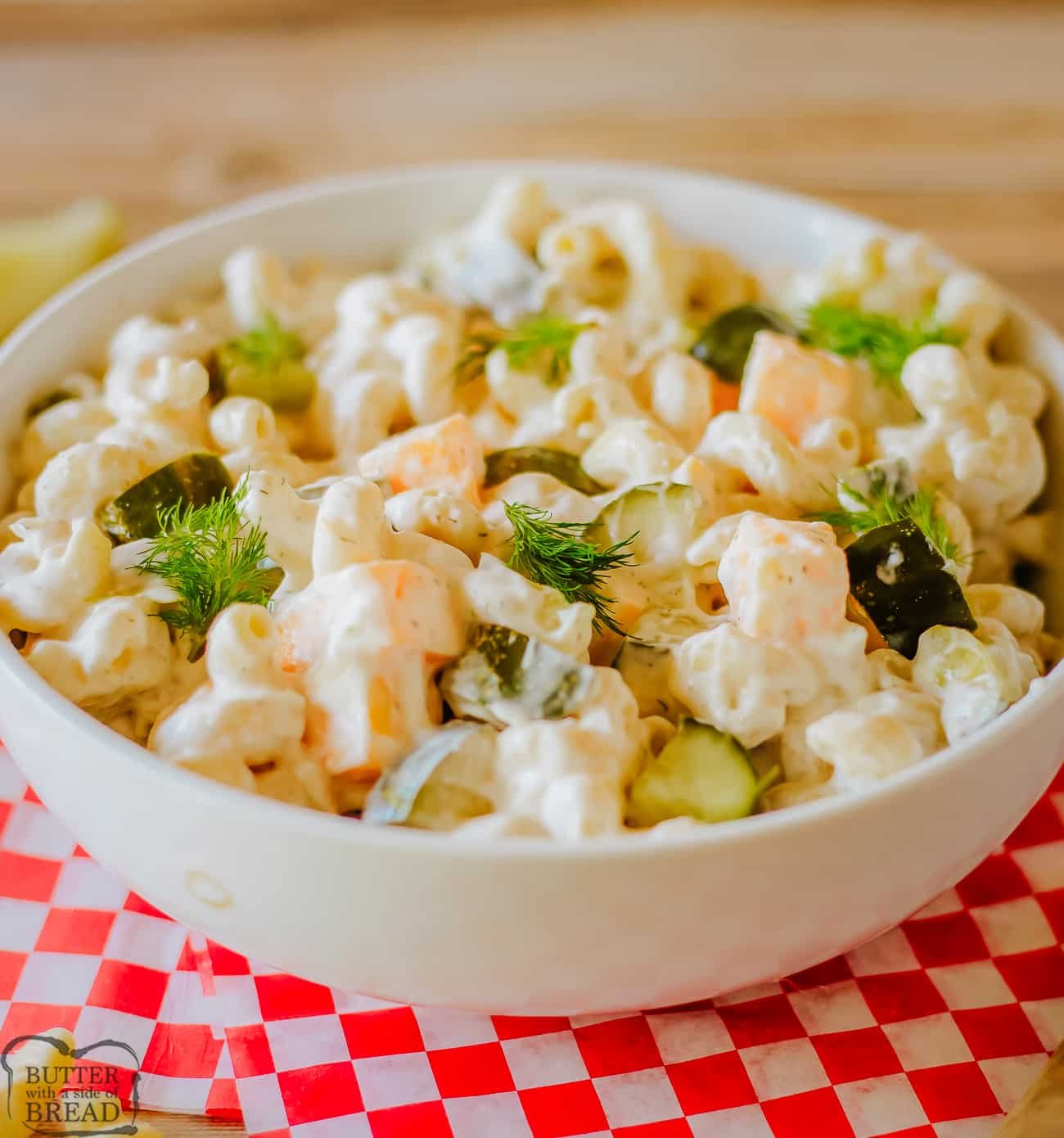 white bowl of dill pickle pasta salad