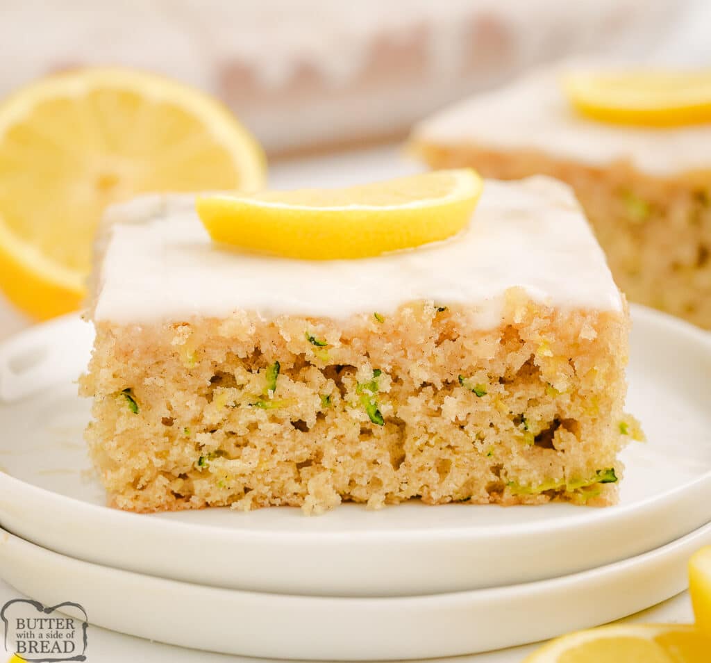 lemon zucchini cake topped with a lemon glaze