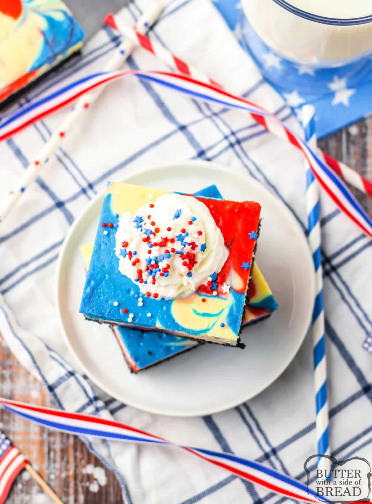 Red, White & Blue Cheesecake Bars are perfect for the 4th of July, Memorial Day, or any other patriotic occasion! Add a simple cheesecake filling to an Oreo crust to make this delicious dessert recipe!