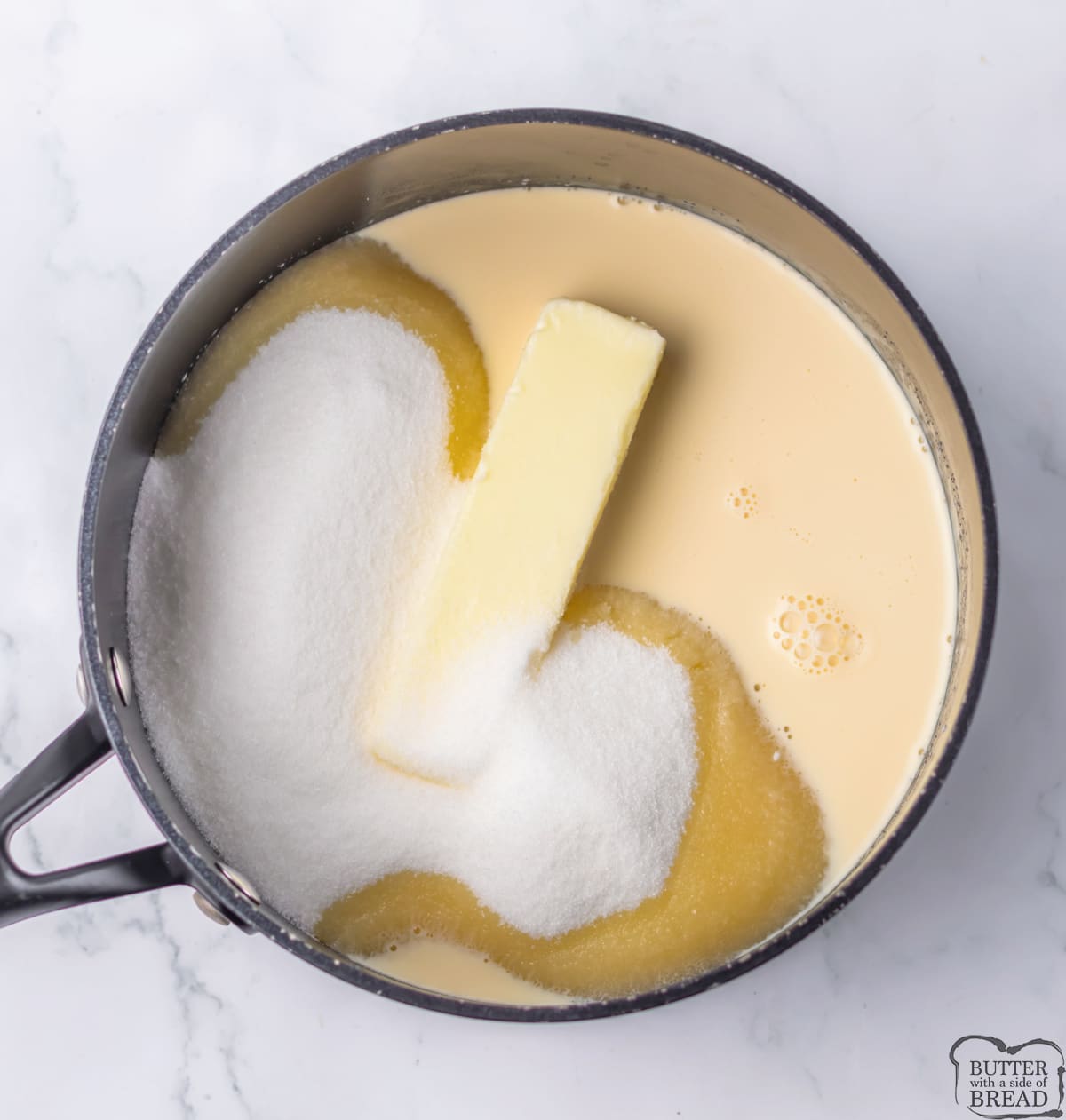 Mix sugar, butter and evaporated milk in saucepan. 