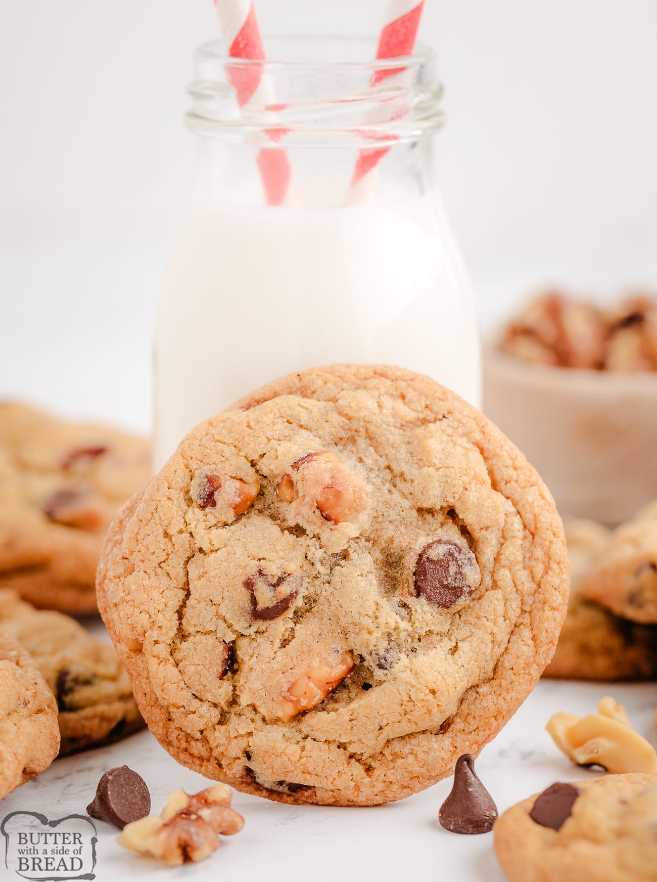 toasted walnut cookies with a bottle of milk