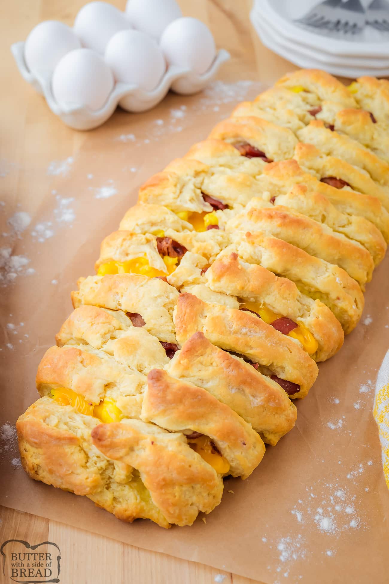 bacon egg and cheese breakfast biscuit braid on a platter