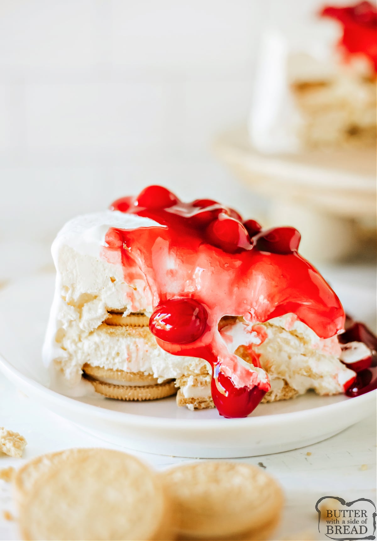 Slice of no-bake cherry cheesecake made with Golden Oreos.