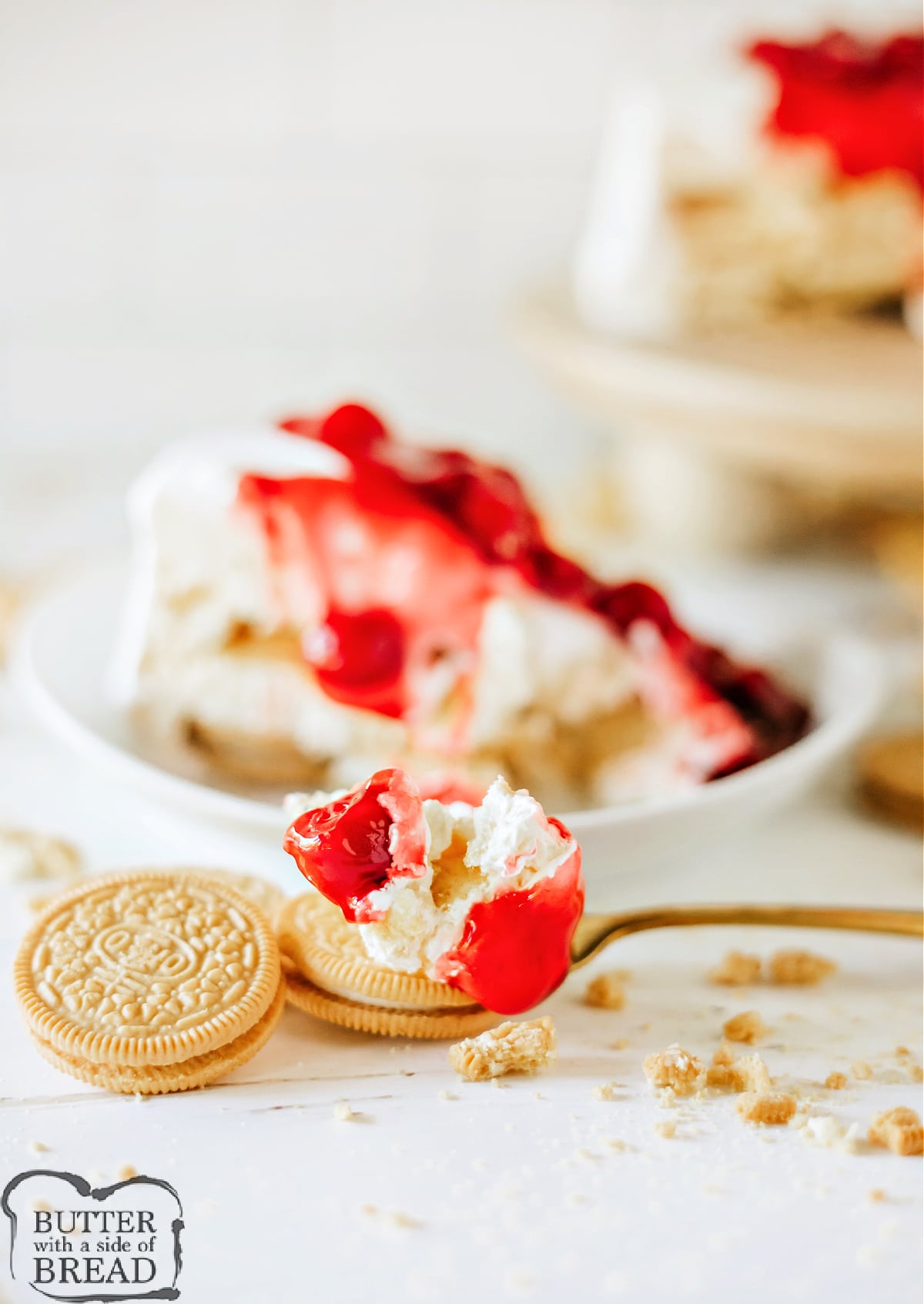 Bite of cherry cheesecake dessert.
