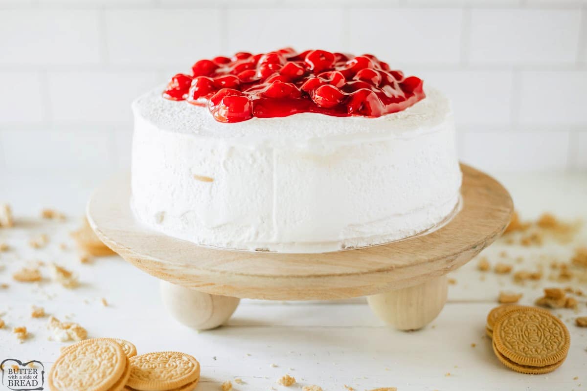 Add cherry pie filling to the top of the cheesecake icebox dessert.