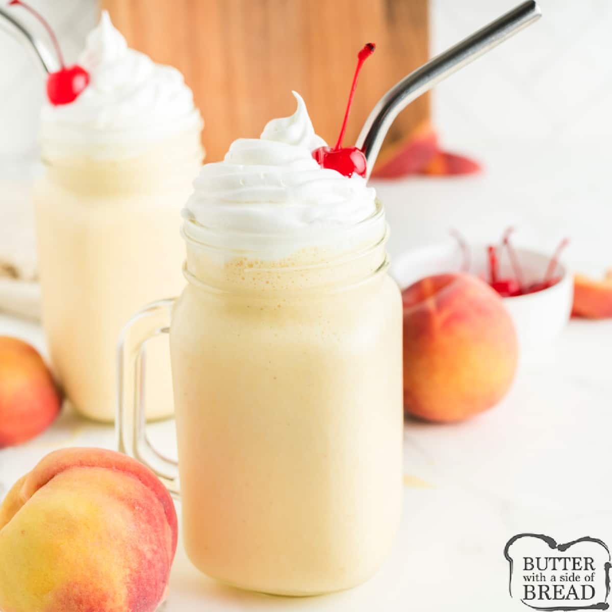 Easy Peach Milkshakes are made with vanilla ice cream, canned peaches, and milk. Add whipped cream and a cherry on top for a deliciously cold treat that is perfect for summer!