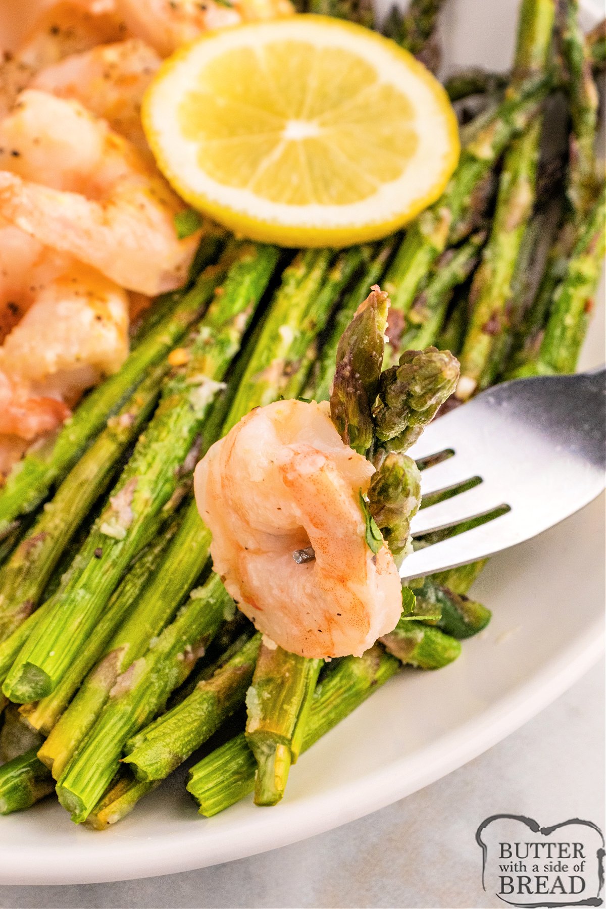 Sheet Pan Lemon Garlic Shrimp and Asparagus is a simple dinner ready in less than 30 minutes. A one-dish meal that is easy and delicious.