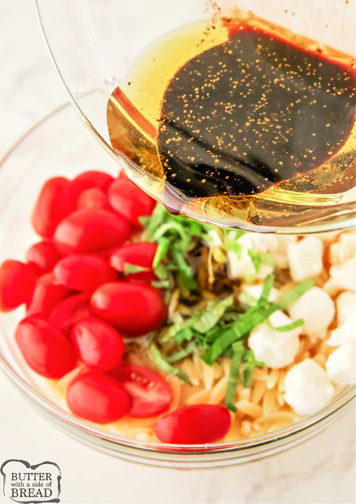 Caprese salad made with orzo and balsamic vinegar dressing. 