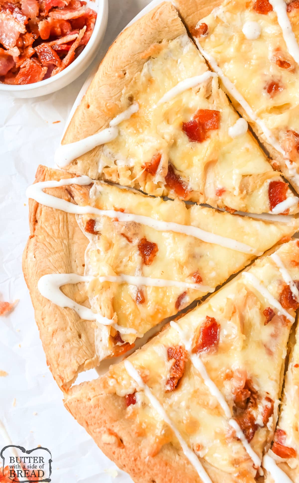 Chicken Bacon Ranch Pizza is made in less than 30 minutes with simple ingredients. Delicious pizza recipe that is just as fast as your favorite take-out!