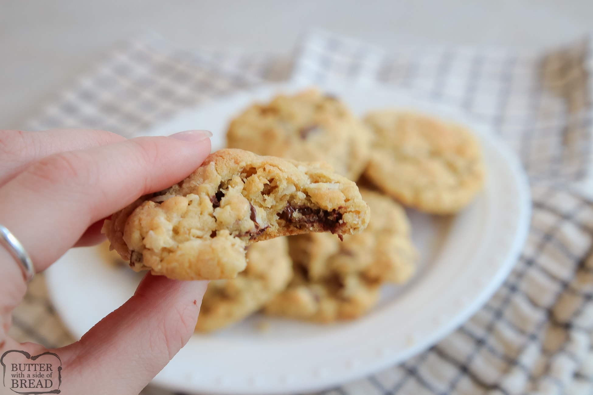 bite taken out of a chocolate chip ranger cookie