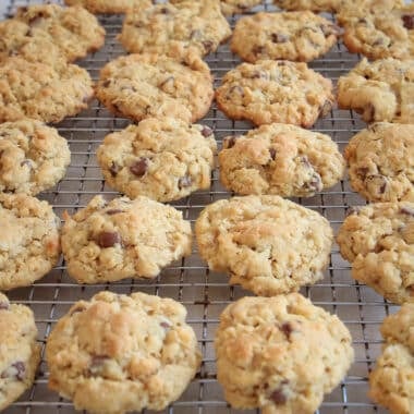 chocolate chip ranger cookies on a cooling rack