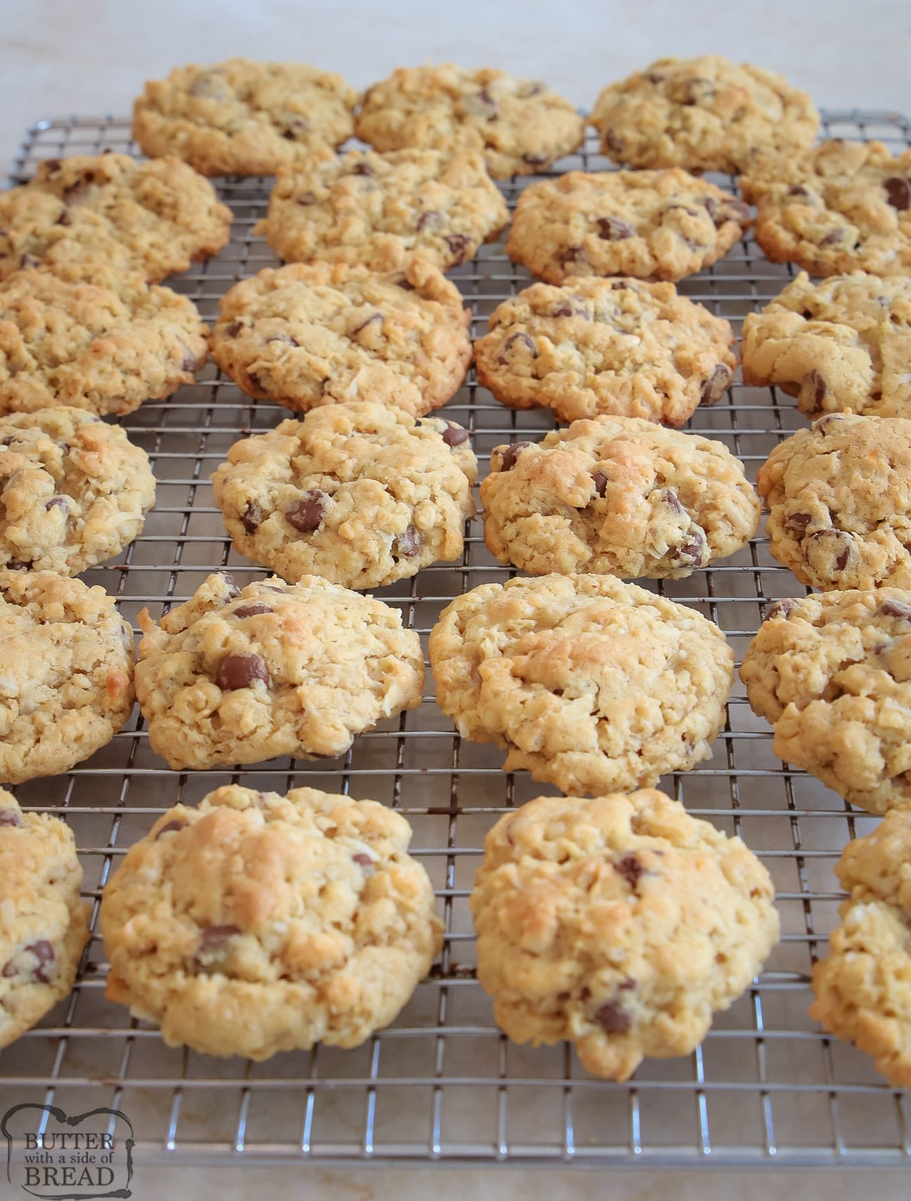 chocolate chip ranger cookies on a cooling rack