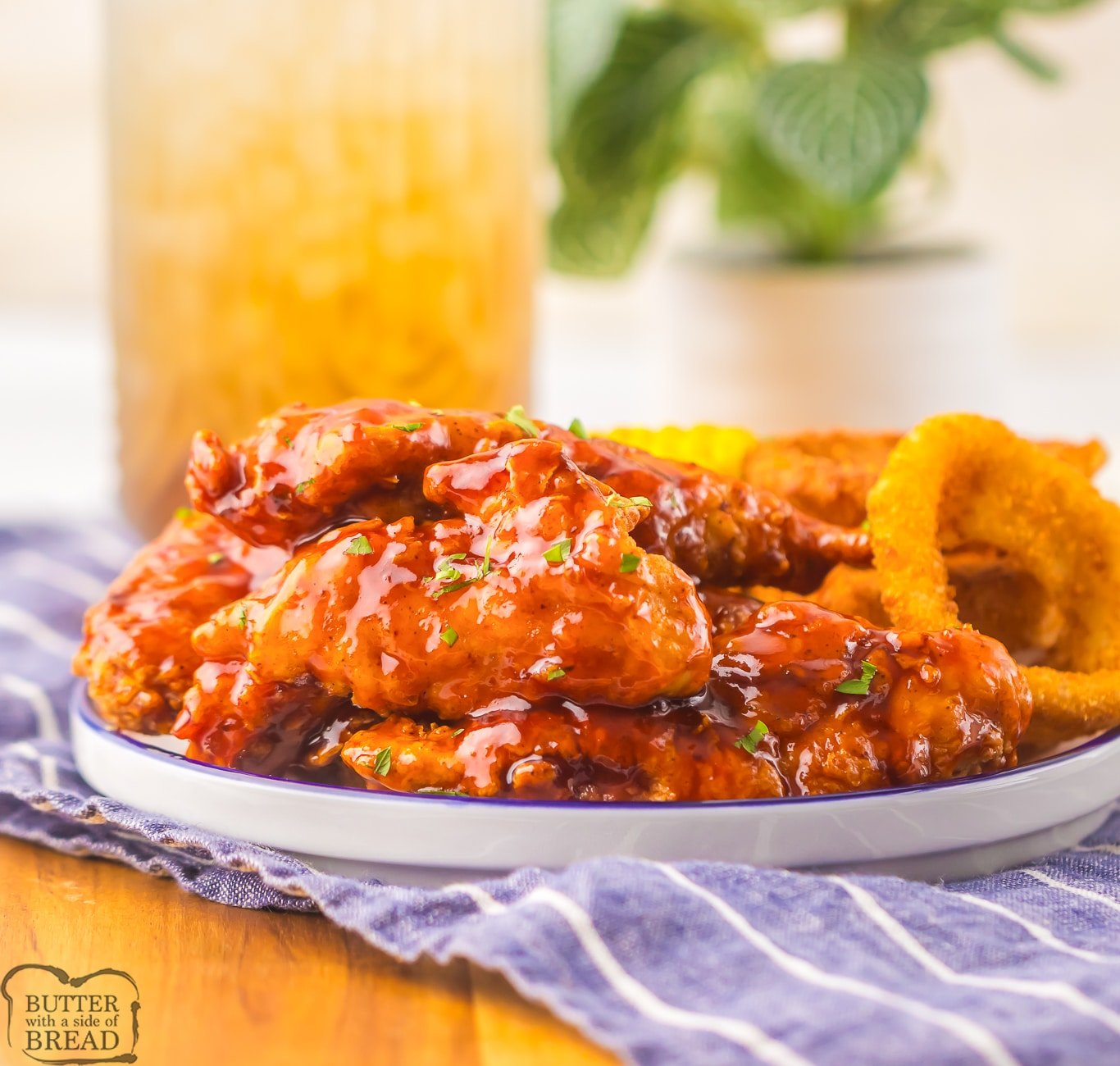 serving a copycat Chili's crispers with corn and onion rings