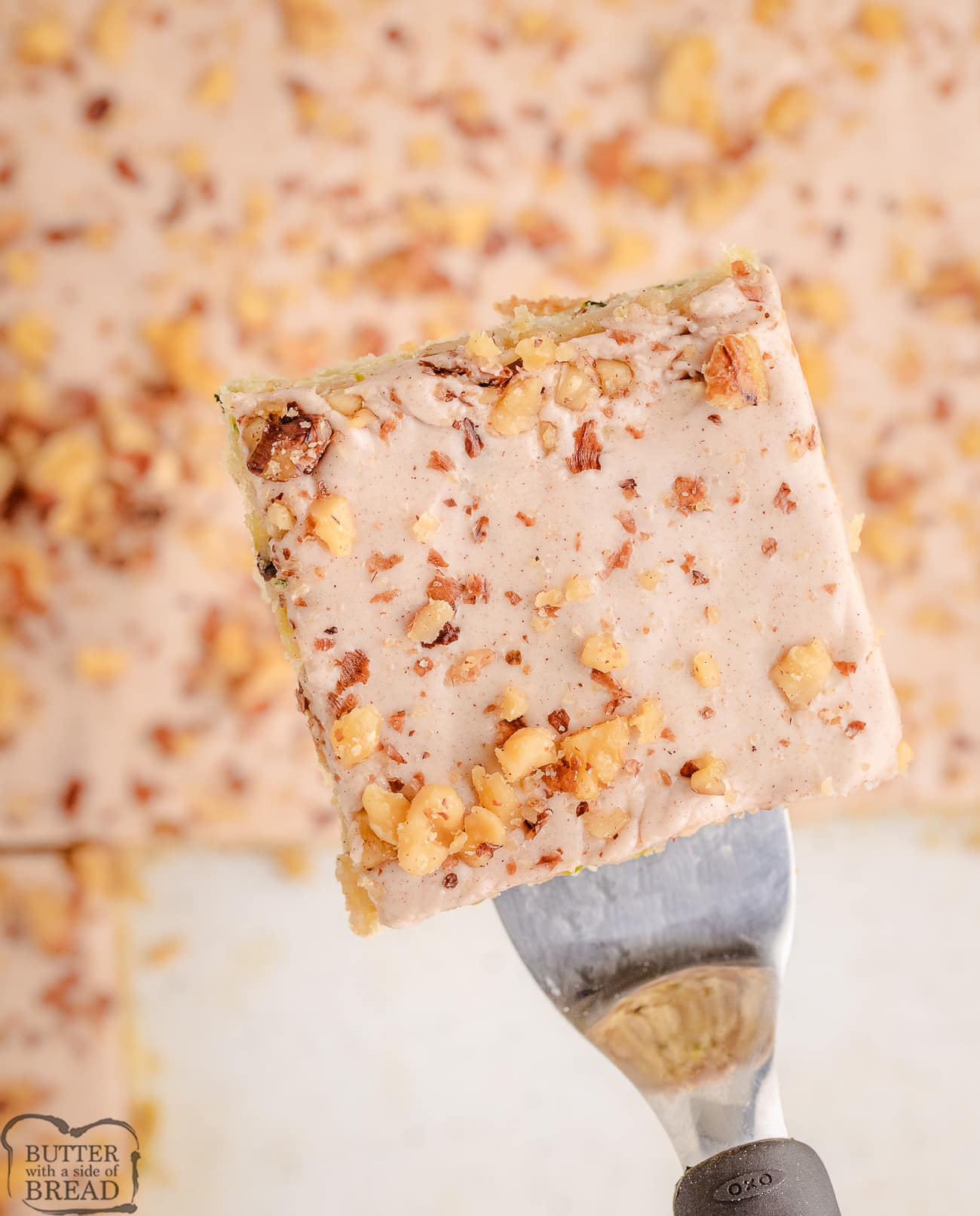 serving up a zucchini bread bar topped with walnuts