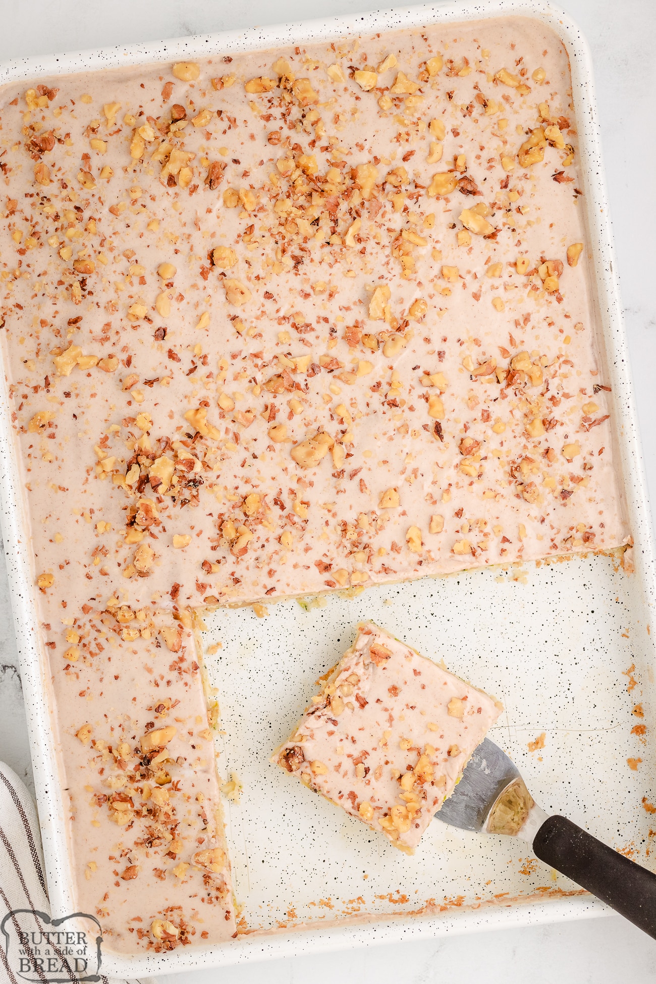 sheet pan with cinnamon walnut zucchini bread bars