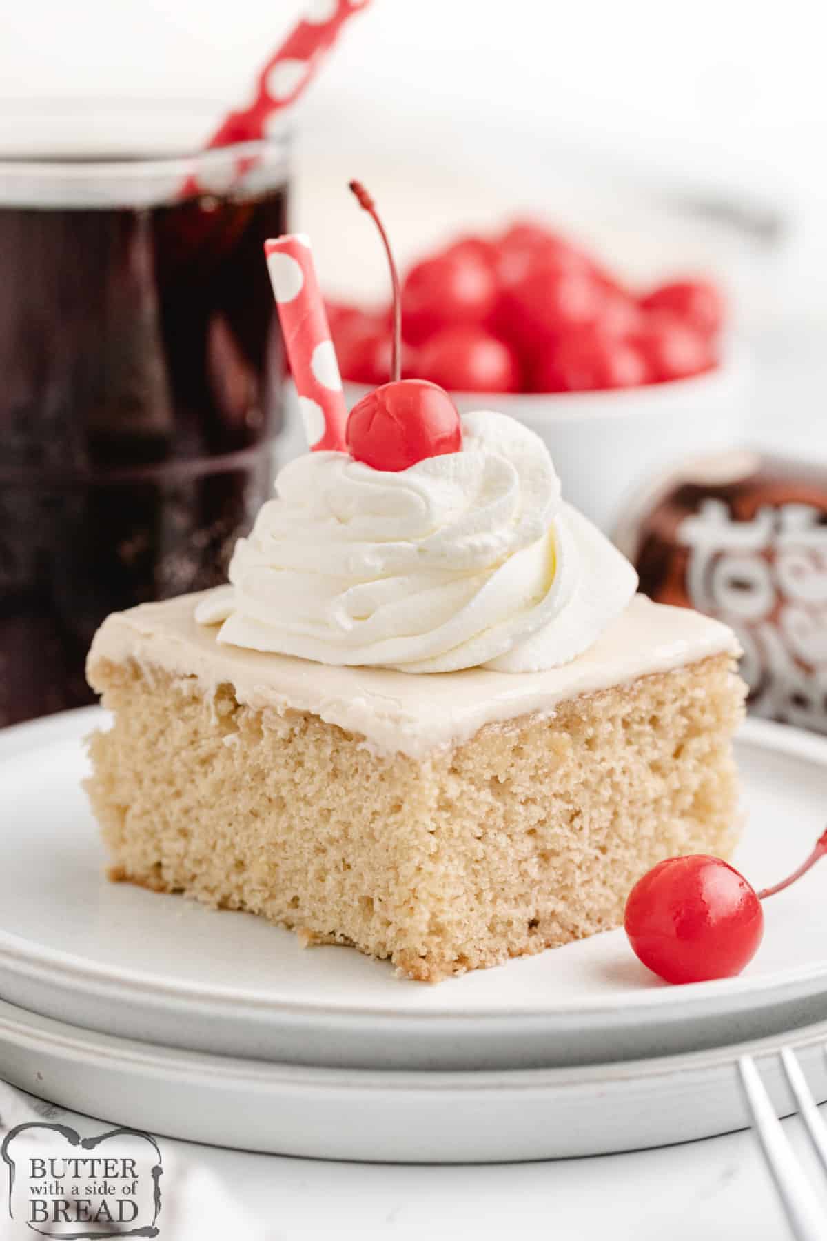 Homemade cake recipe with whipped cream and cherries. 