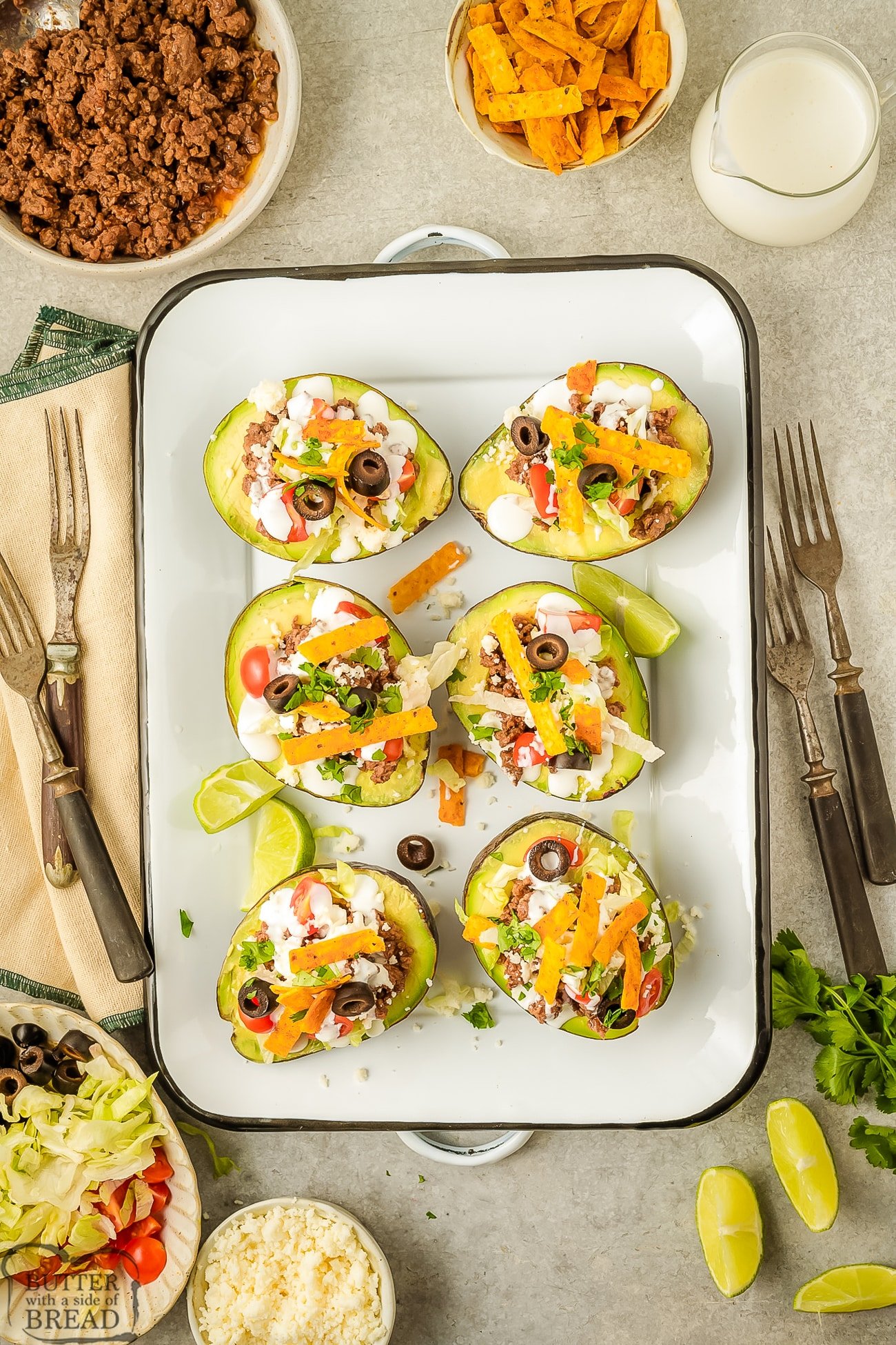 beef taco stuffed avocados on a tray