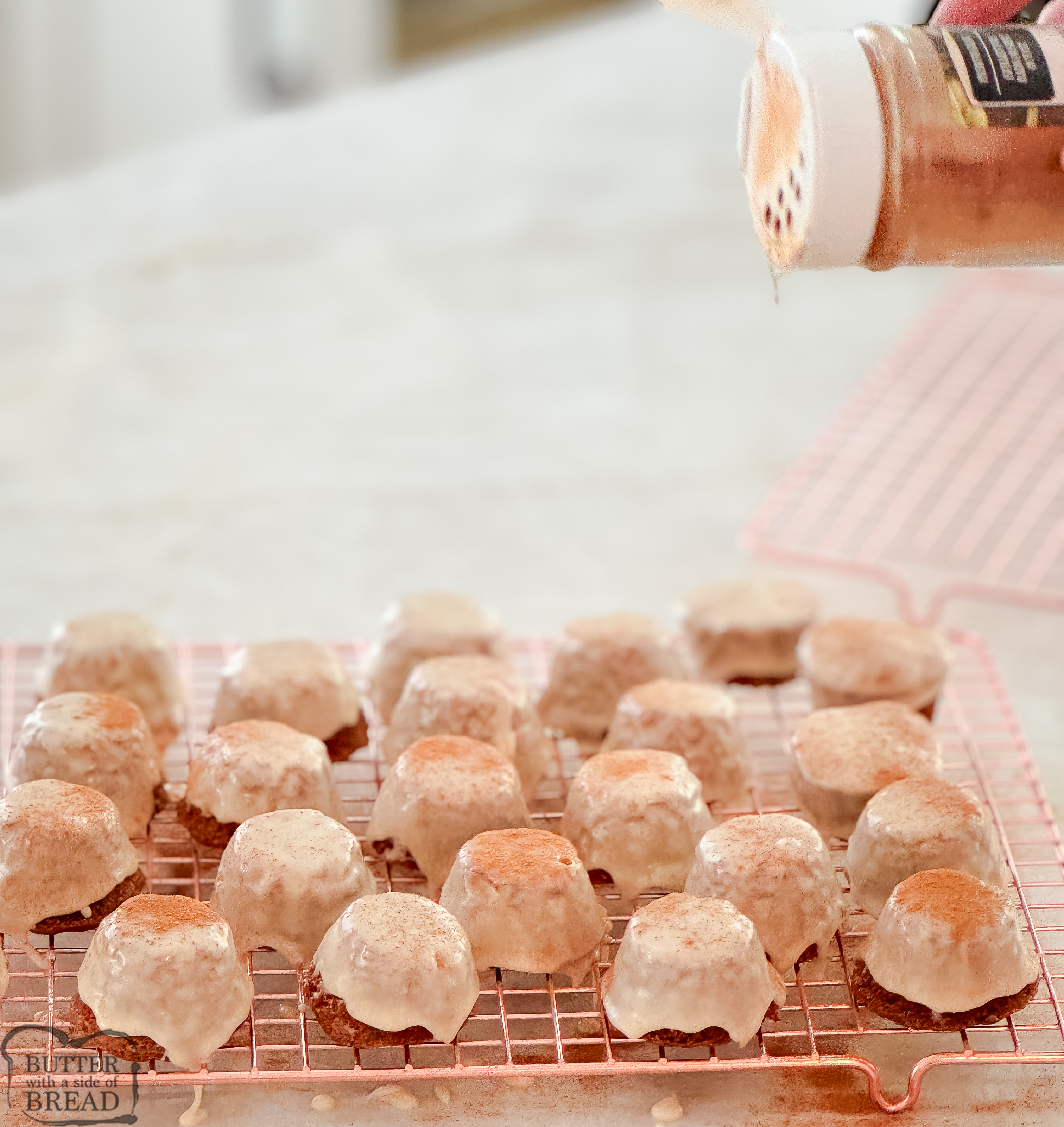 dusting cinnamon onto zucchini bread bites