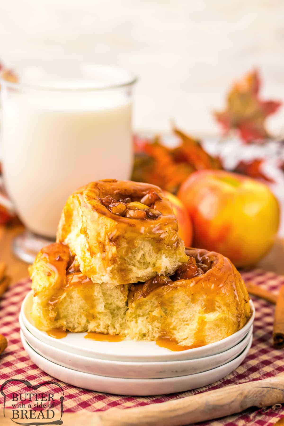 Caramel Apple Hawaiian Cinnamon Rolls are the perfect fall treat.  Sweet Hawaiian rolls are brushed with butter, cinnamon, and brown sugar before getting stuffed with a delicious caramel apple filling.  