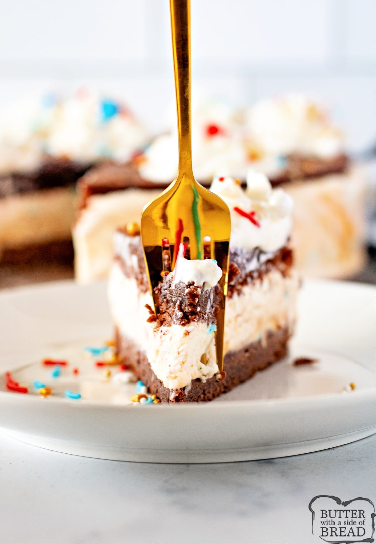 Forkful of ice cream cake made with brownies. 