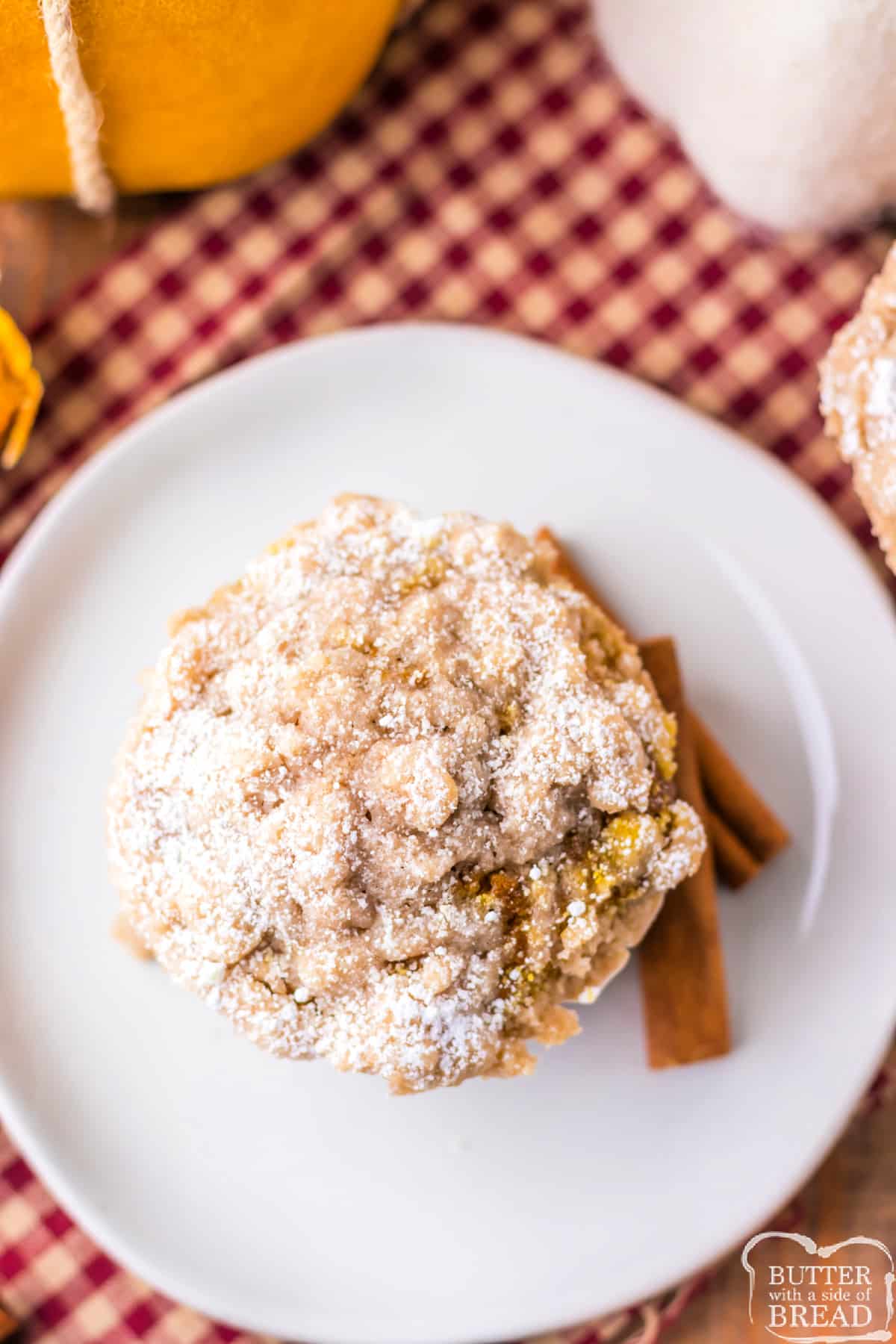 Copycat Costco Pumpkin Muffins are moist, flavorful, and topped with a crumb topping and powdered sugar. These are easy to make at home and are the best sweet treat for fall!