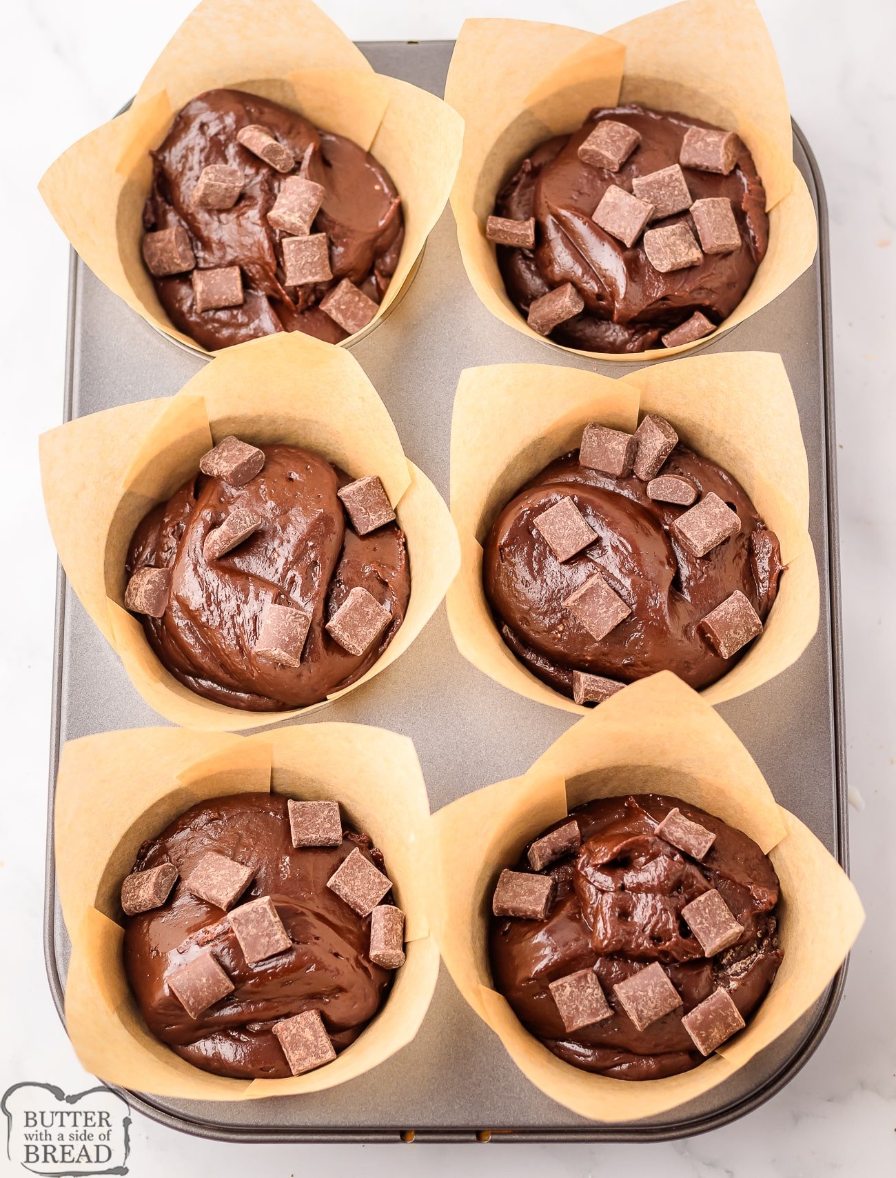 copycat Olympic Village chocolate muffins in a jumbo muffin pan