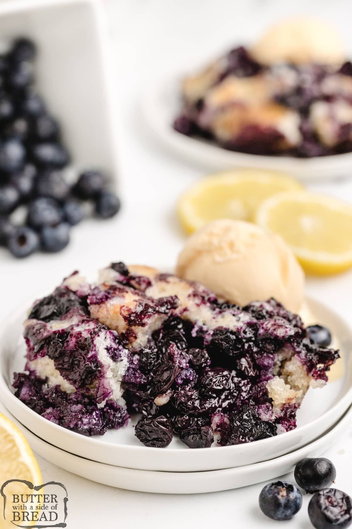 Easy Blueberry Cobbler made with a simple buttery crust and fresh blueberries. A delicious blueberry dessert that is best served warm with a scoop of vanilla ice cream.