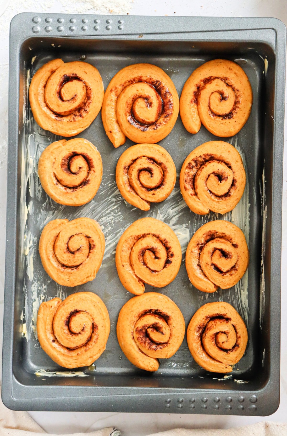 Place rolls in baking dish to rise before baking.