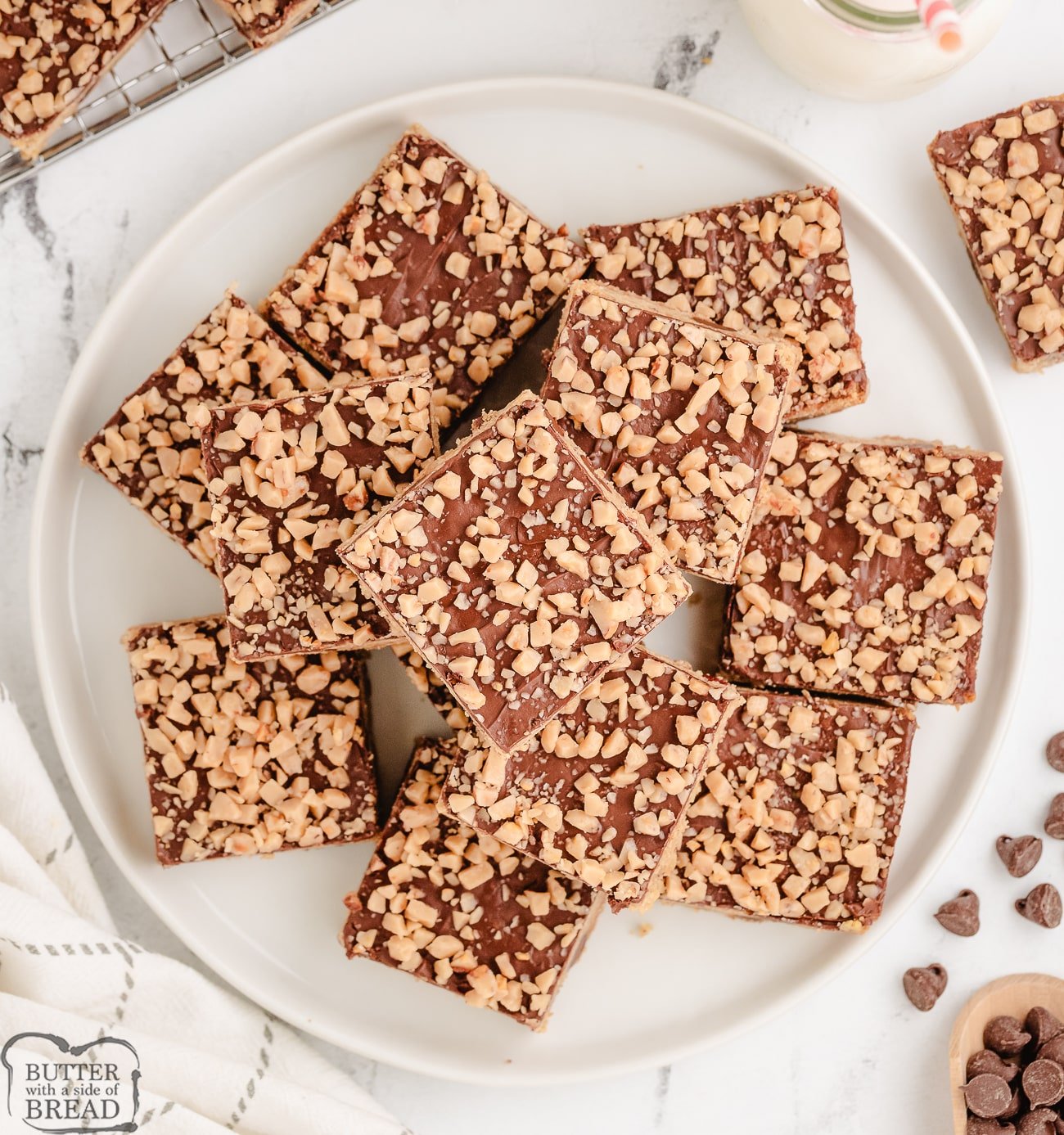 chocolate toffee bars cut into squares and arranged on a plate