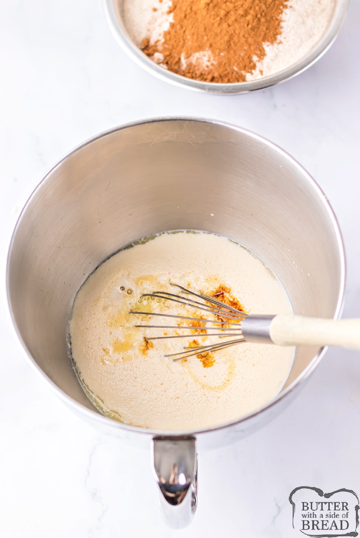 Mix warm milk, brown sugar, and yeast. 