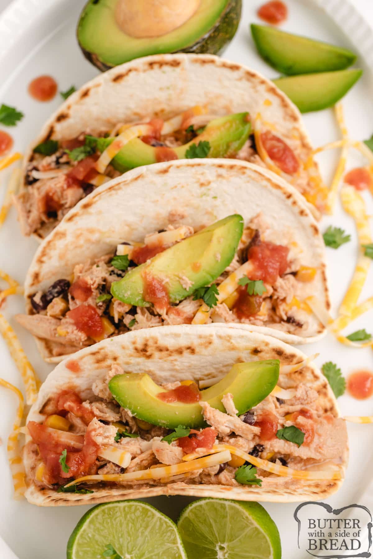 Crockpot Salsa Chicken Tacos is an easy weeknight dinner made with 5 ingredients and less than 5 minutes of prep time! Dump everything in the crockpot, turn it on, and dinner will be ready in a few hours!