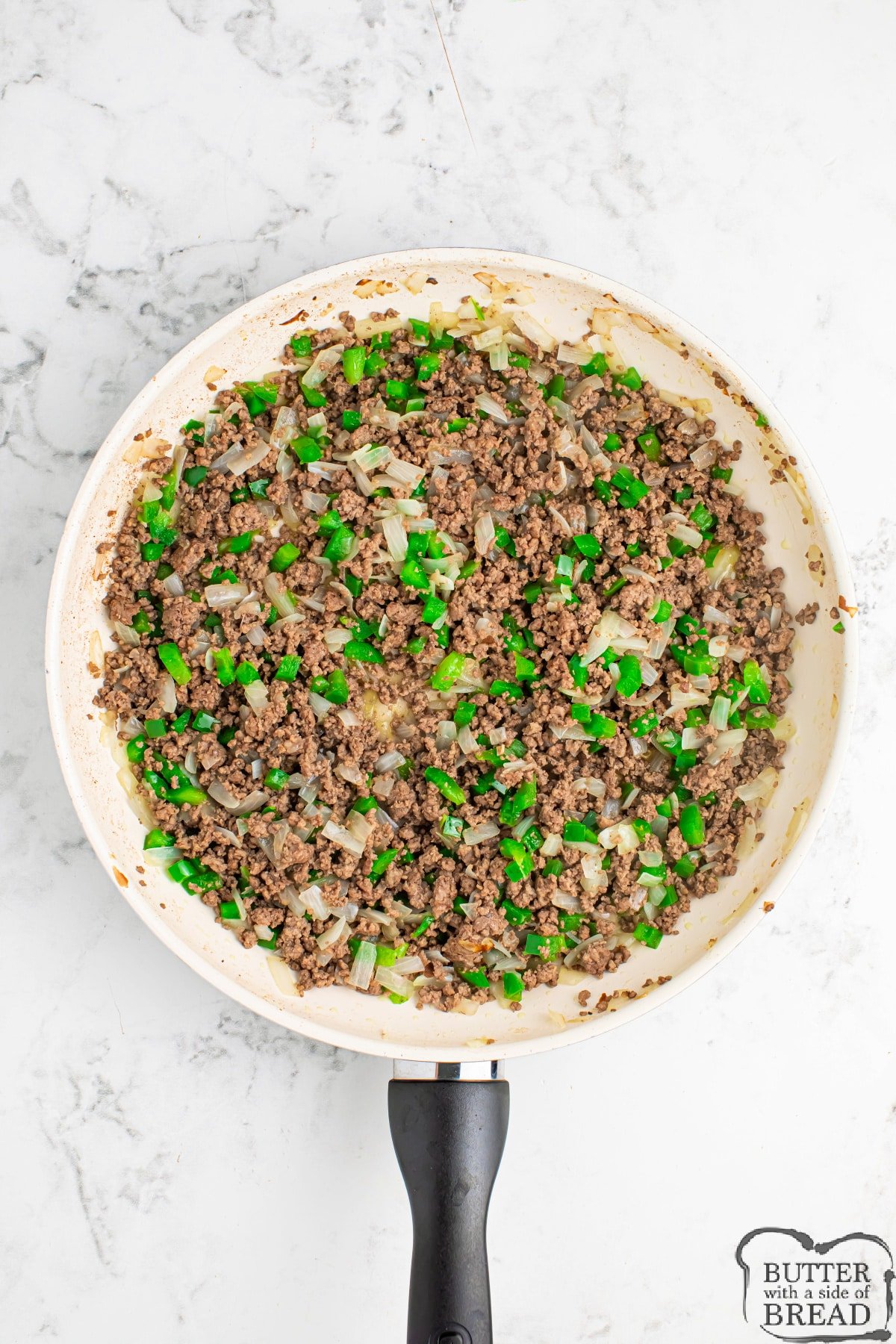 Ground beef cooked with green peppers and onions. 