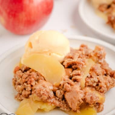 scoop of peanut butter apple crisp on a white plate