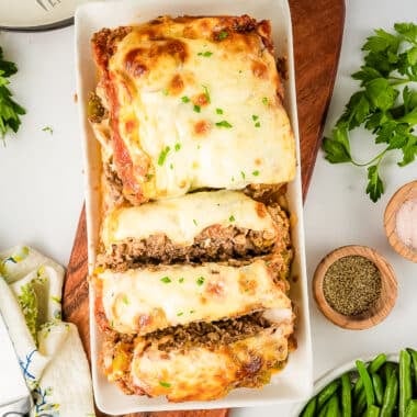 philly cheesecake meatloaf sliced in a pan