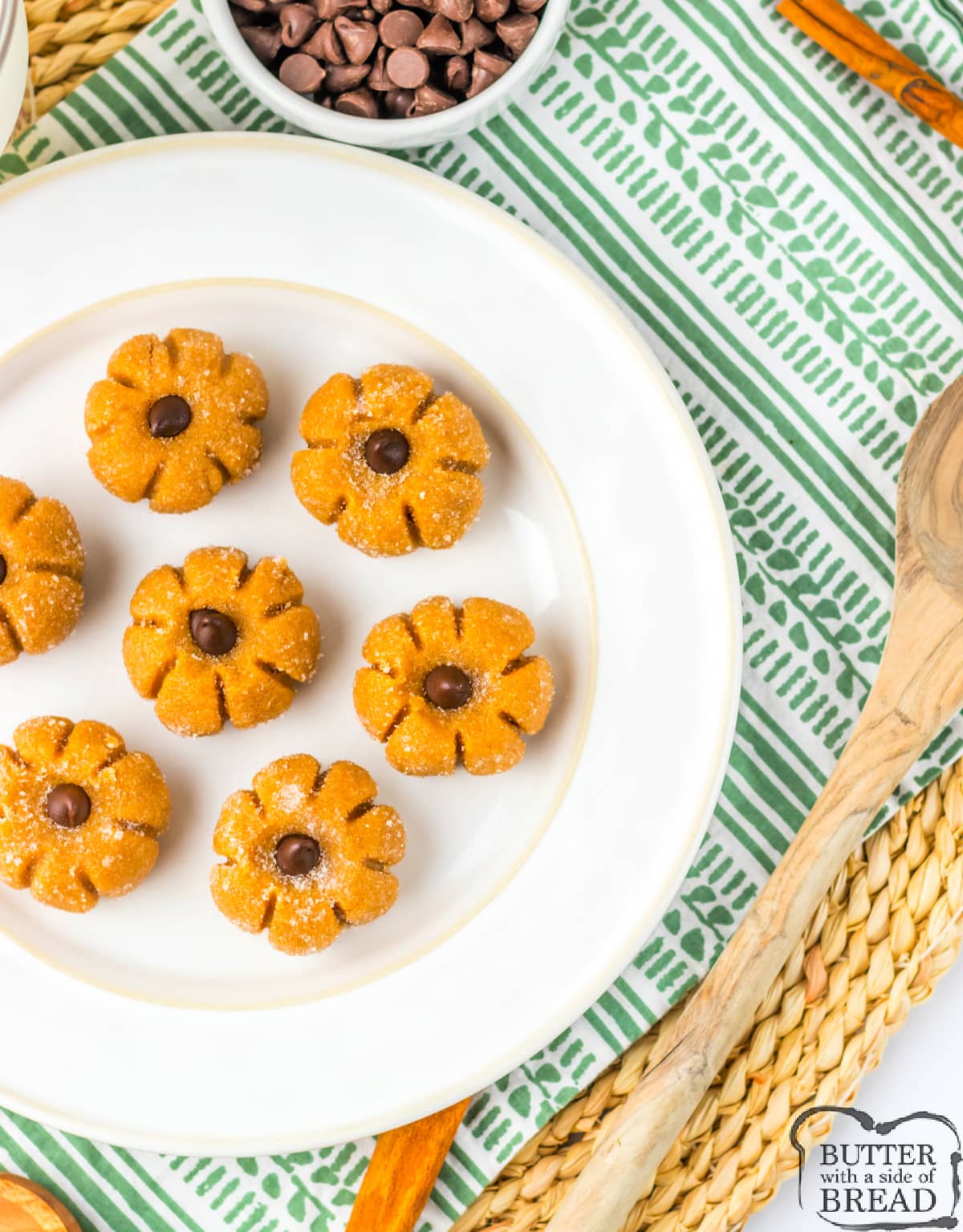 Pumpkin shaped fudge with a chocolate chip on top.