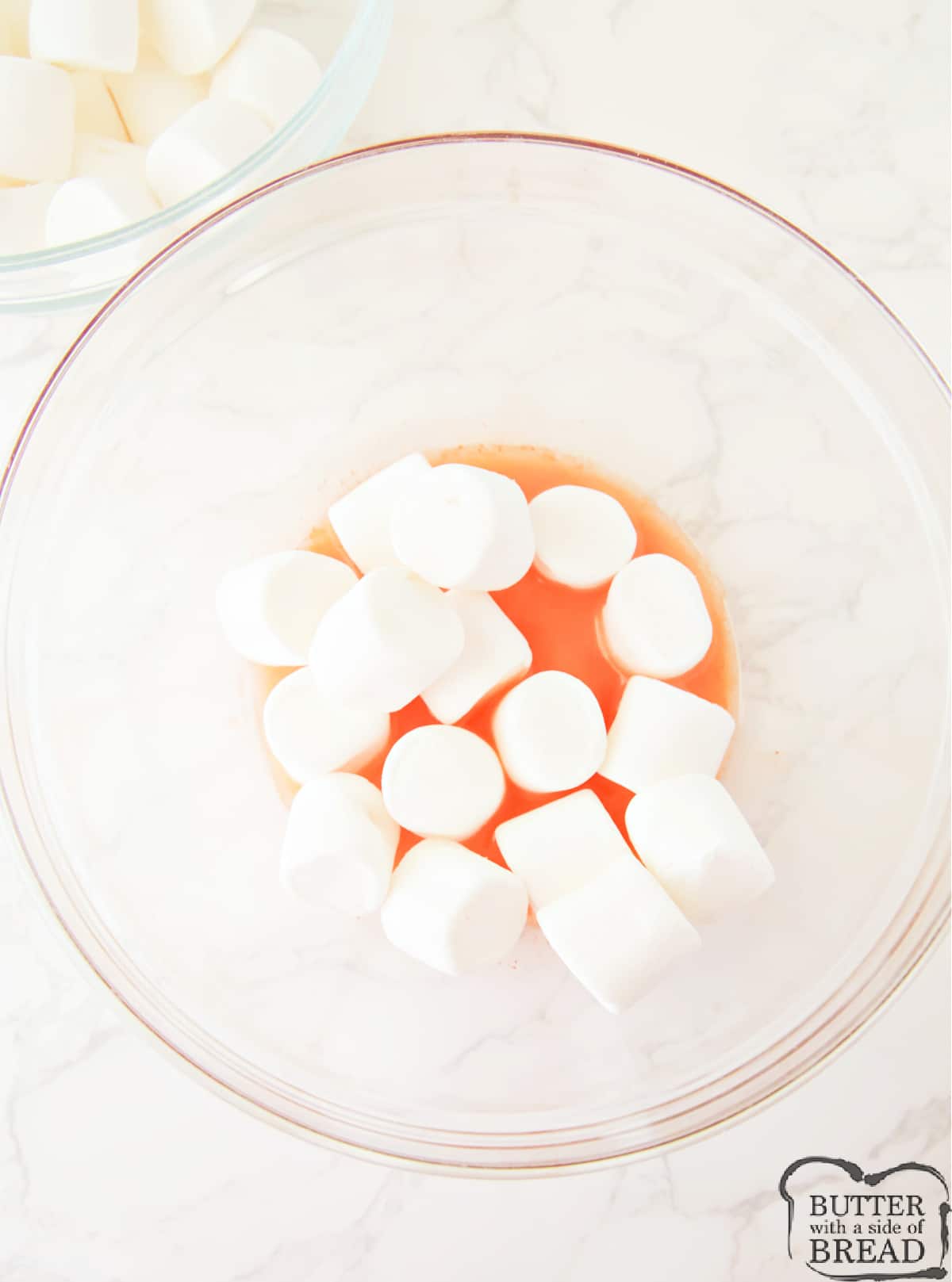 Add marshmallows to melted butter. 