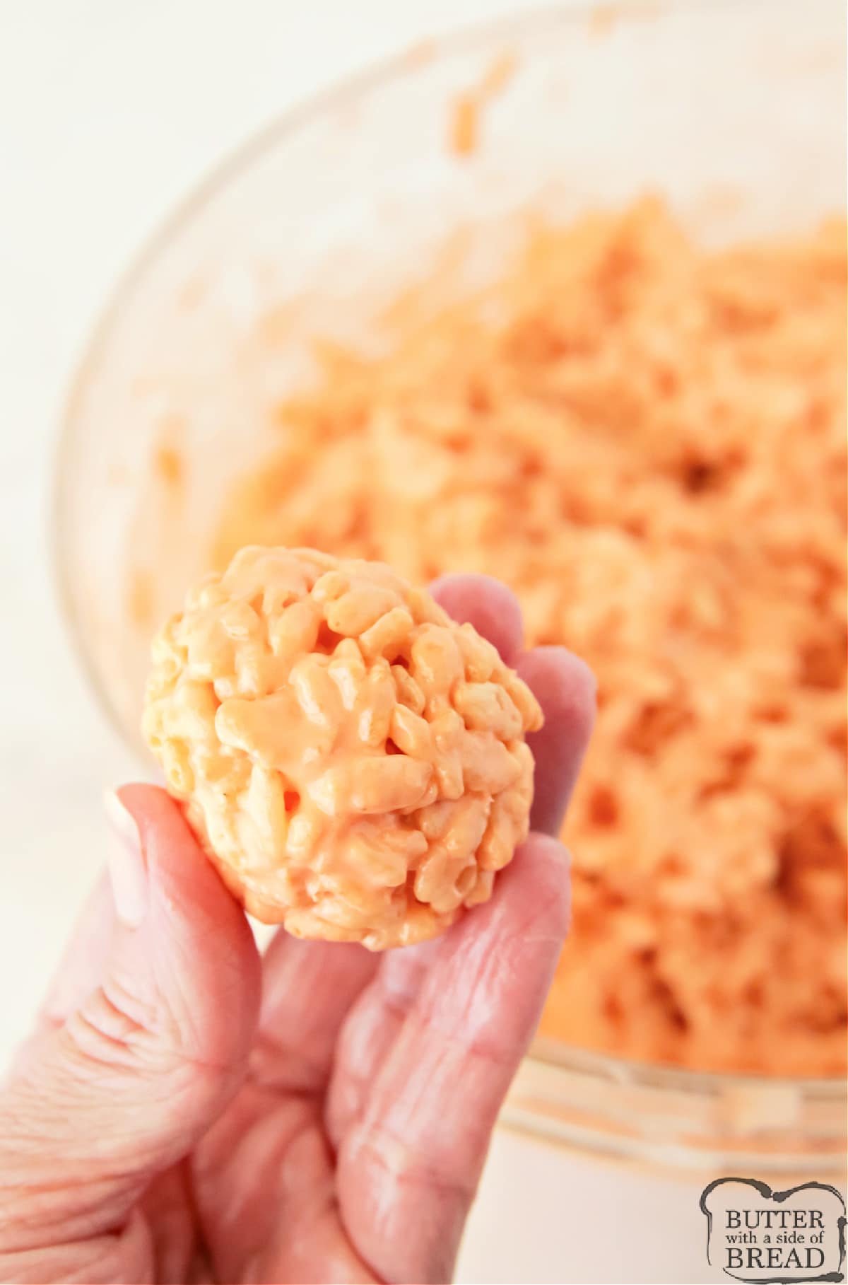 Form balls with rice krispie treat mixture. 