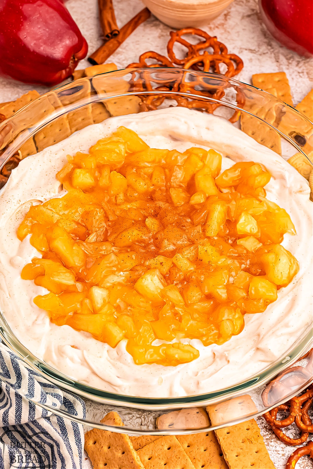 Apple Pie Dip is deliciously creamy and perfect for dipping pretzels, graham crackers, and fruit slices. It requires only six simple ingredients and tastes just like apple pie!