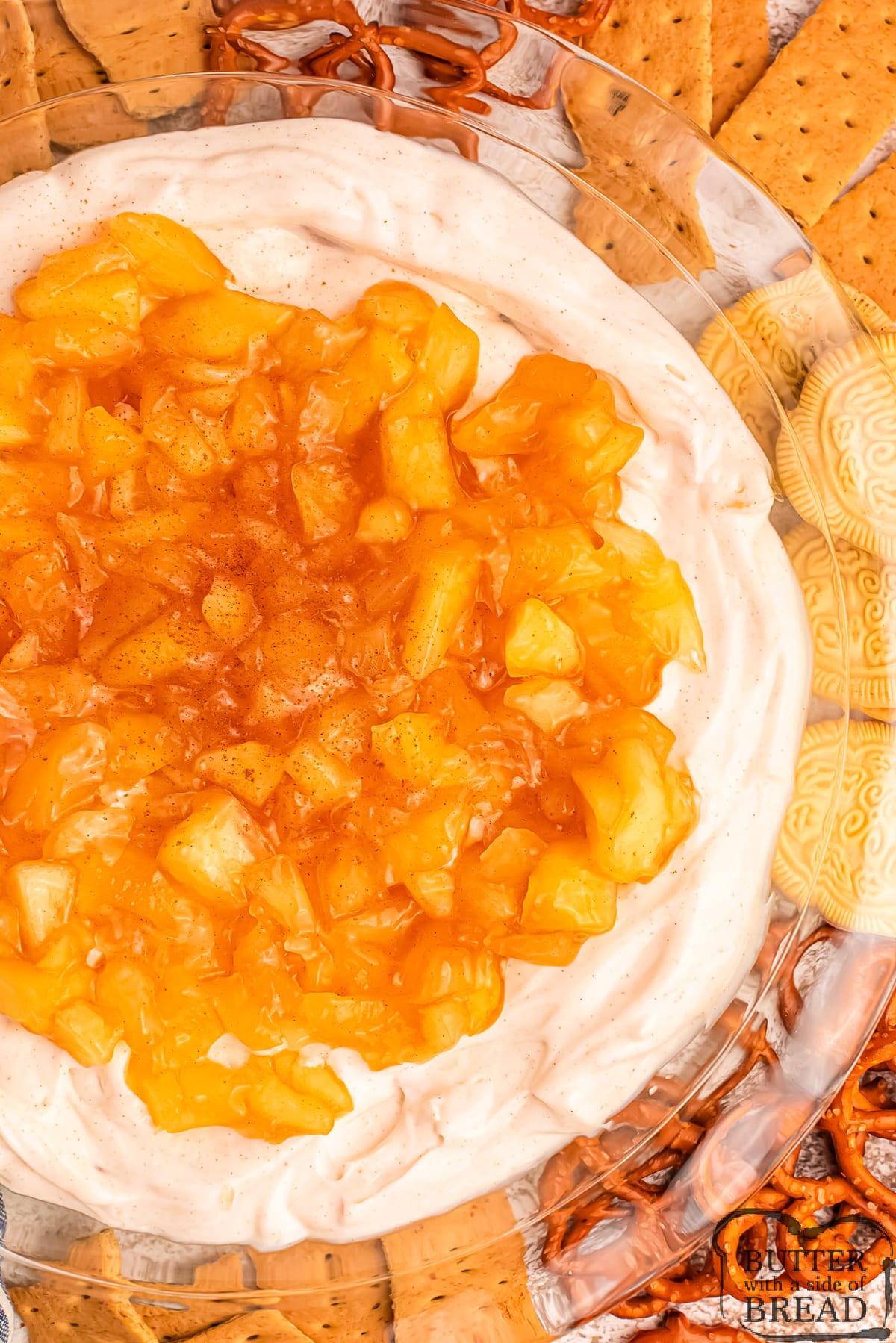 Apple Pie Dip is deliciously creamy and perfect for dipping pretzels, graham crackers, and fruit slices. It requires only six simple ingredients and tastes just like apple pie!