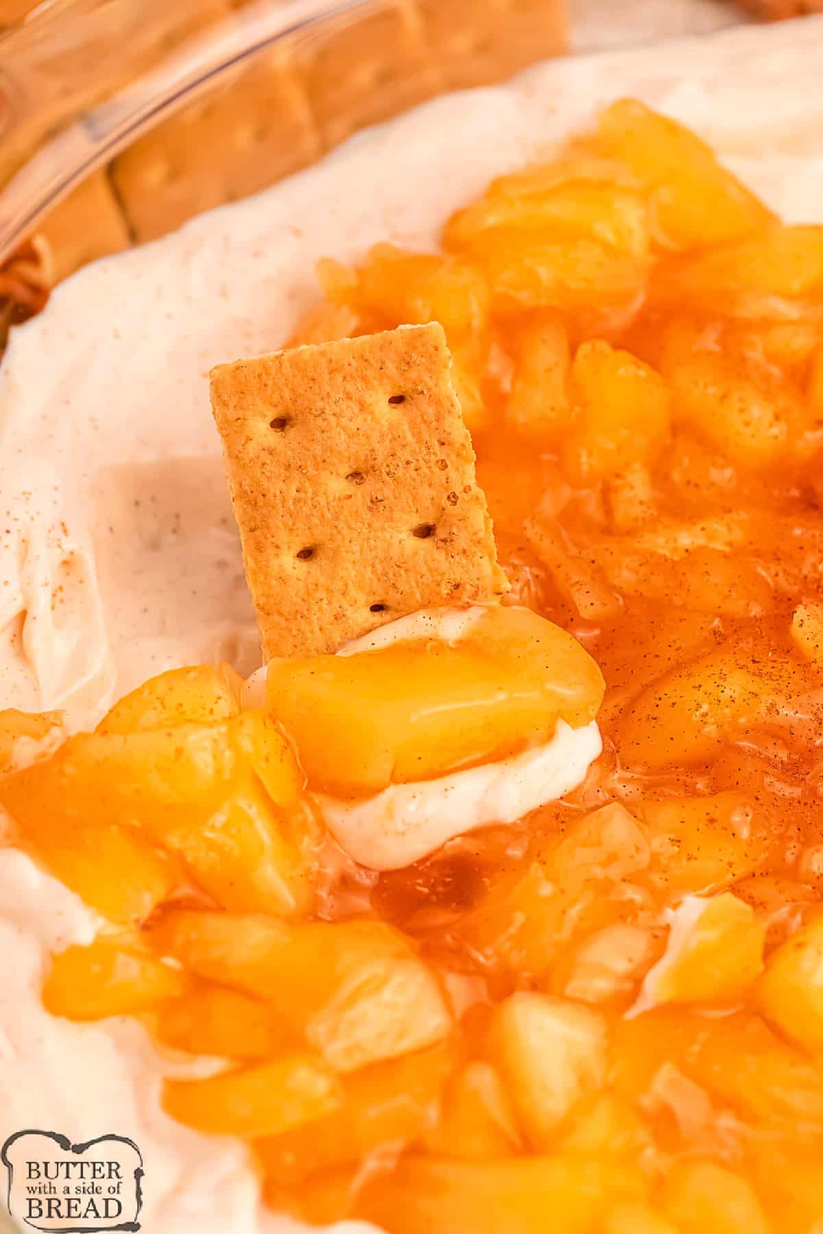Apple Pie Dip is deliciously creamy and perfect for dipping pretzels, graham crackers, and fruit slices. It requires only six simple ingredients and tastes just like apple pie!