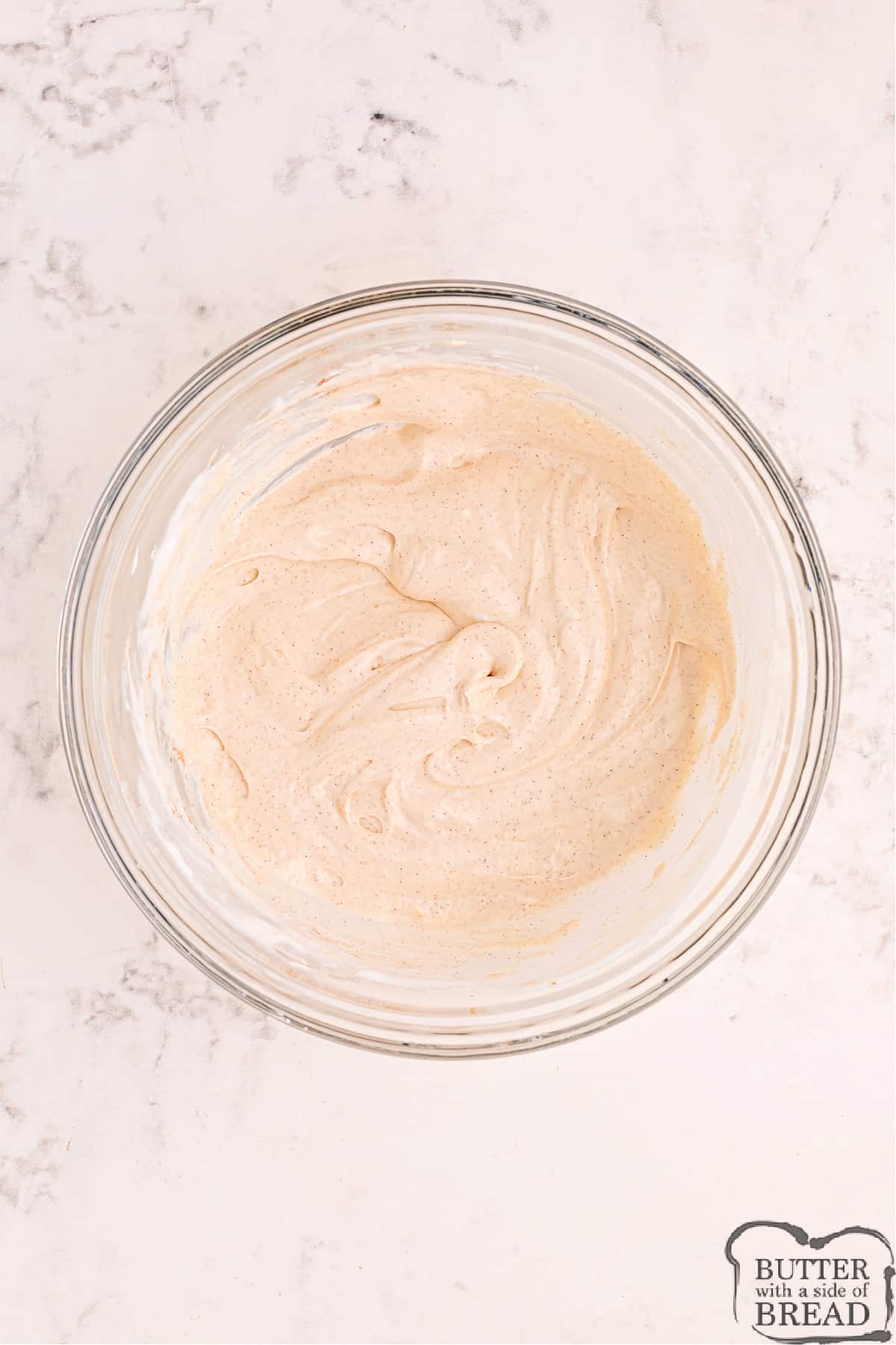 Cream cheese layer in pie pan.