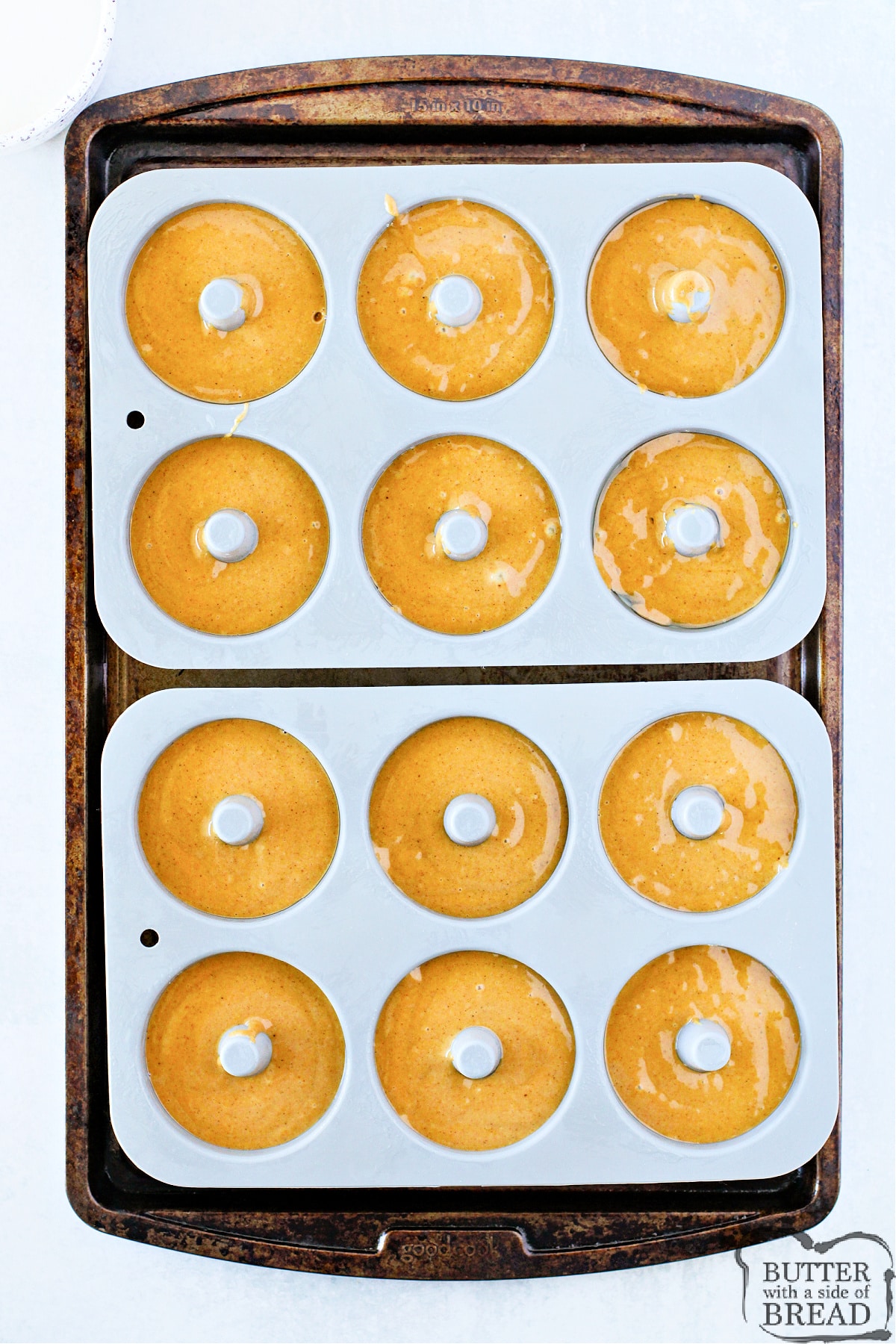 Gingerbread donuts ready to bake.