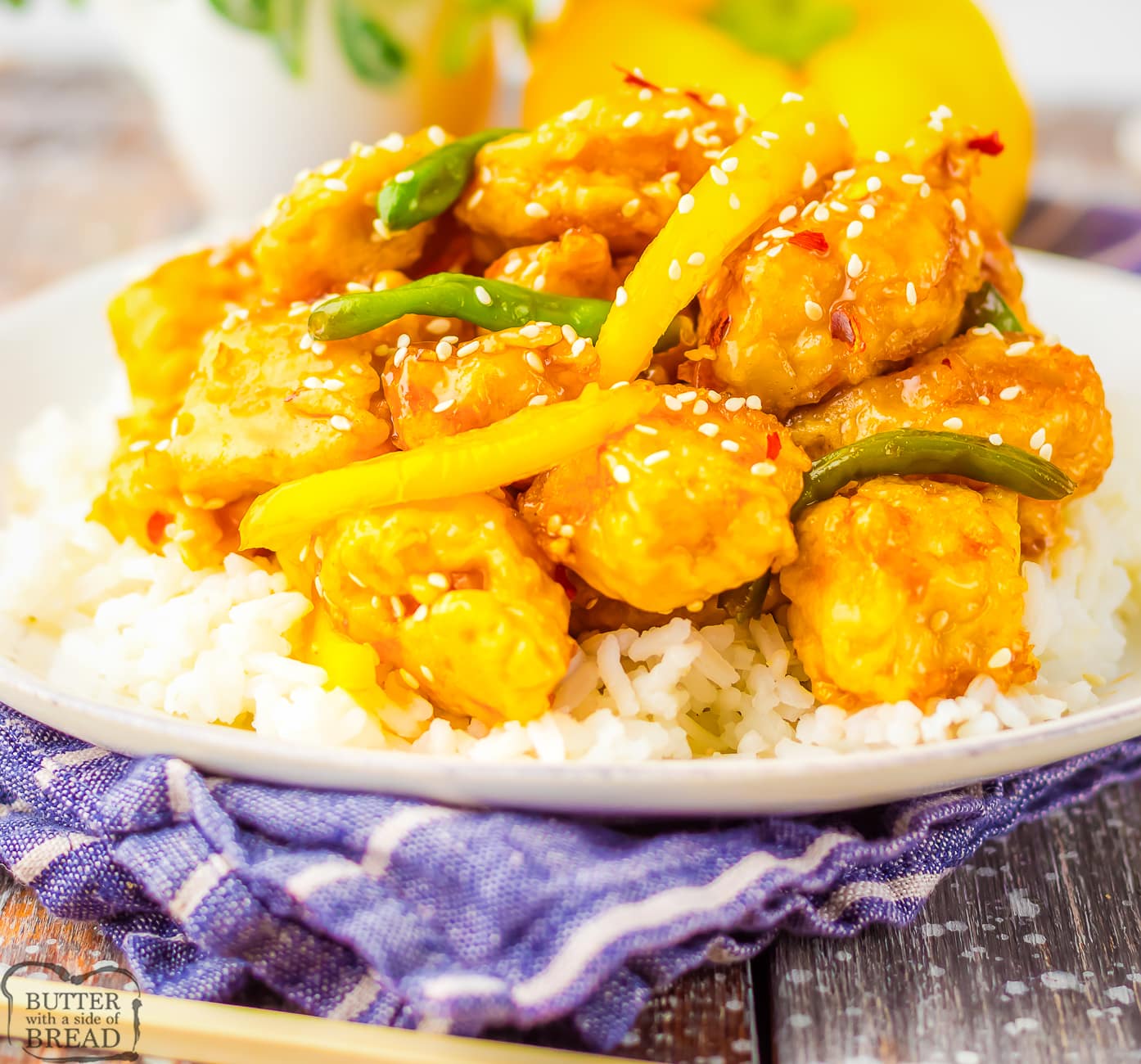 plate of honey sesame chicken with green beans