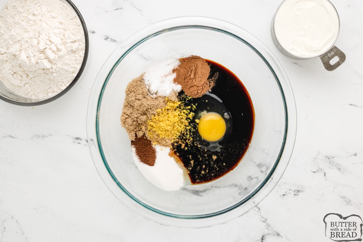 Sugar, brown sugar, molasses, baking soda, cinnamon, ginger, cloves, and lemon zest.