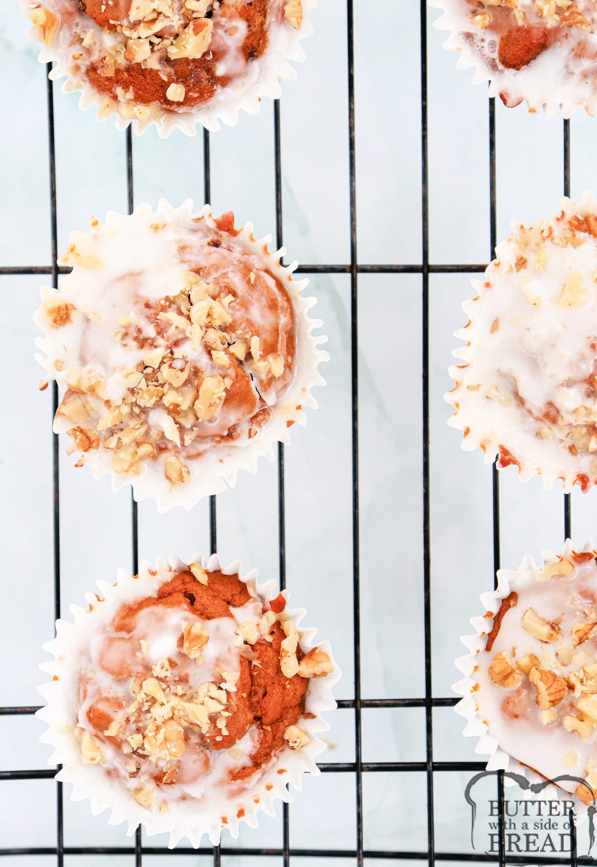 Glazed Pumpkin Walnut Muffins are moist, flavorful, and topped with walnuts and a simple powdered sugar glaze. These are easy to make at home and are the best sweet treat for fall!