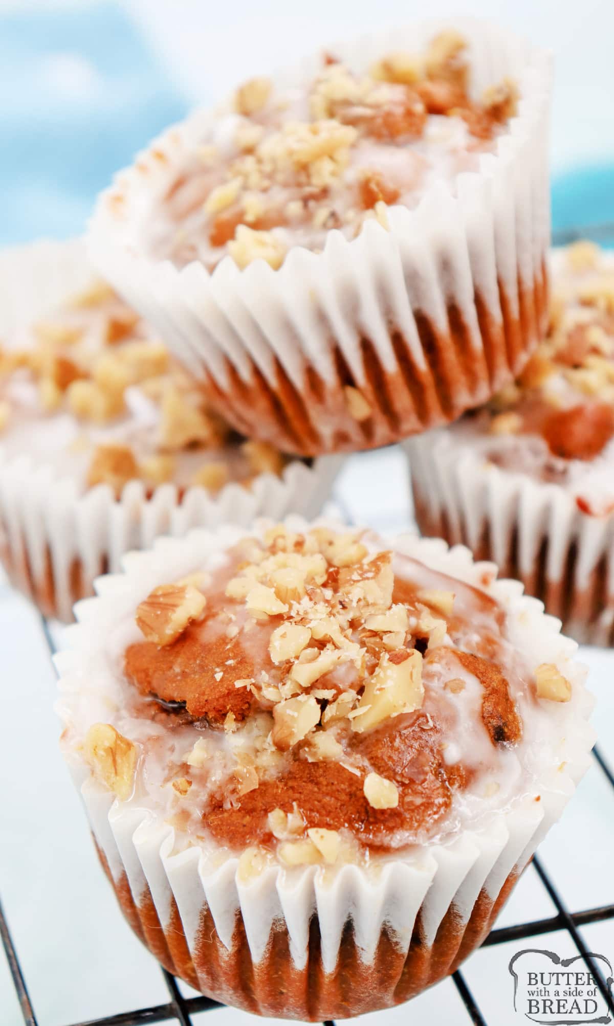 Glazed Pumpkin Walnut Muffins are moist, flavorful, and topped with walnuts and a simple powdered sugar glaze. These are easy to make at home and are the best sweet treat for fall!