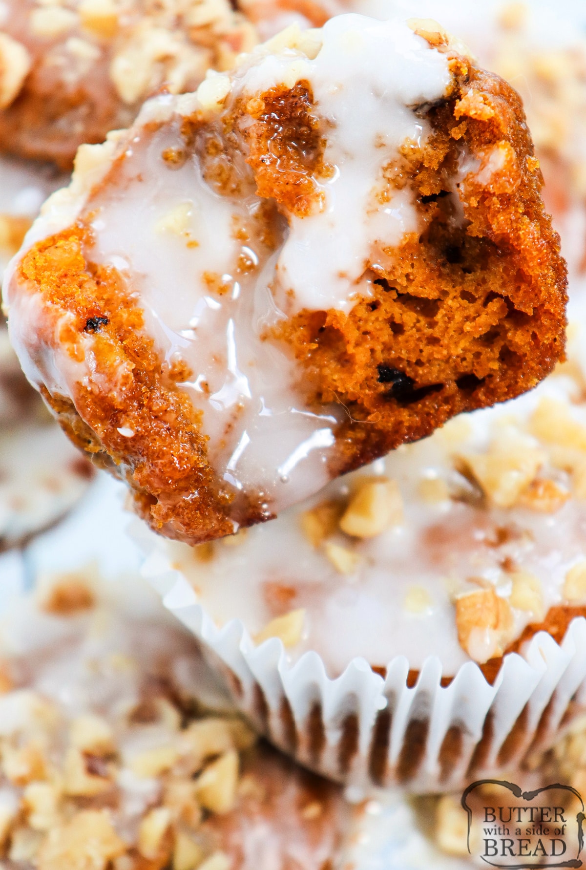 Homemade pumpkin muffins made with powdered sugar glaze.